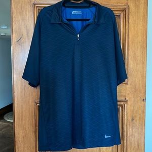 Navy Blue Nike Golf collared shirt with zipper at chest. Size XL